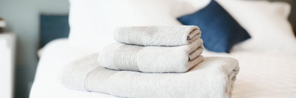 Víte, jak často prát ručníky a ložní prádlo?